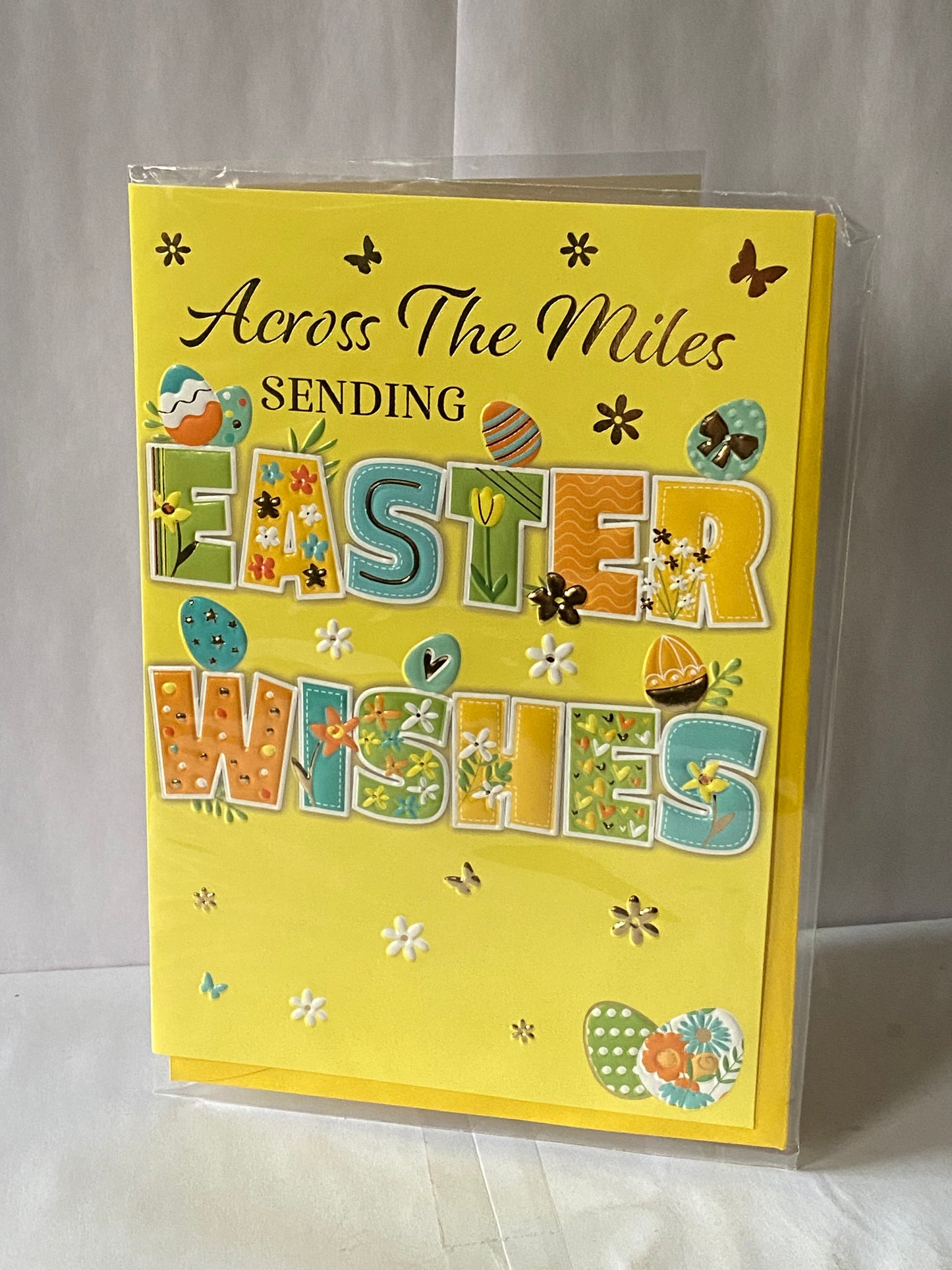 Across The Miles Sending Easter Wishes Easter Card Yellow-Blue/Green/Yellow/Orange Words/Easter Eggs Foil Detail(PH49855B)