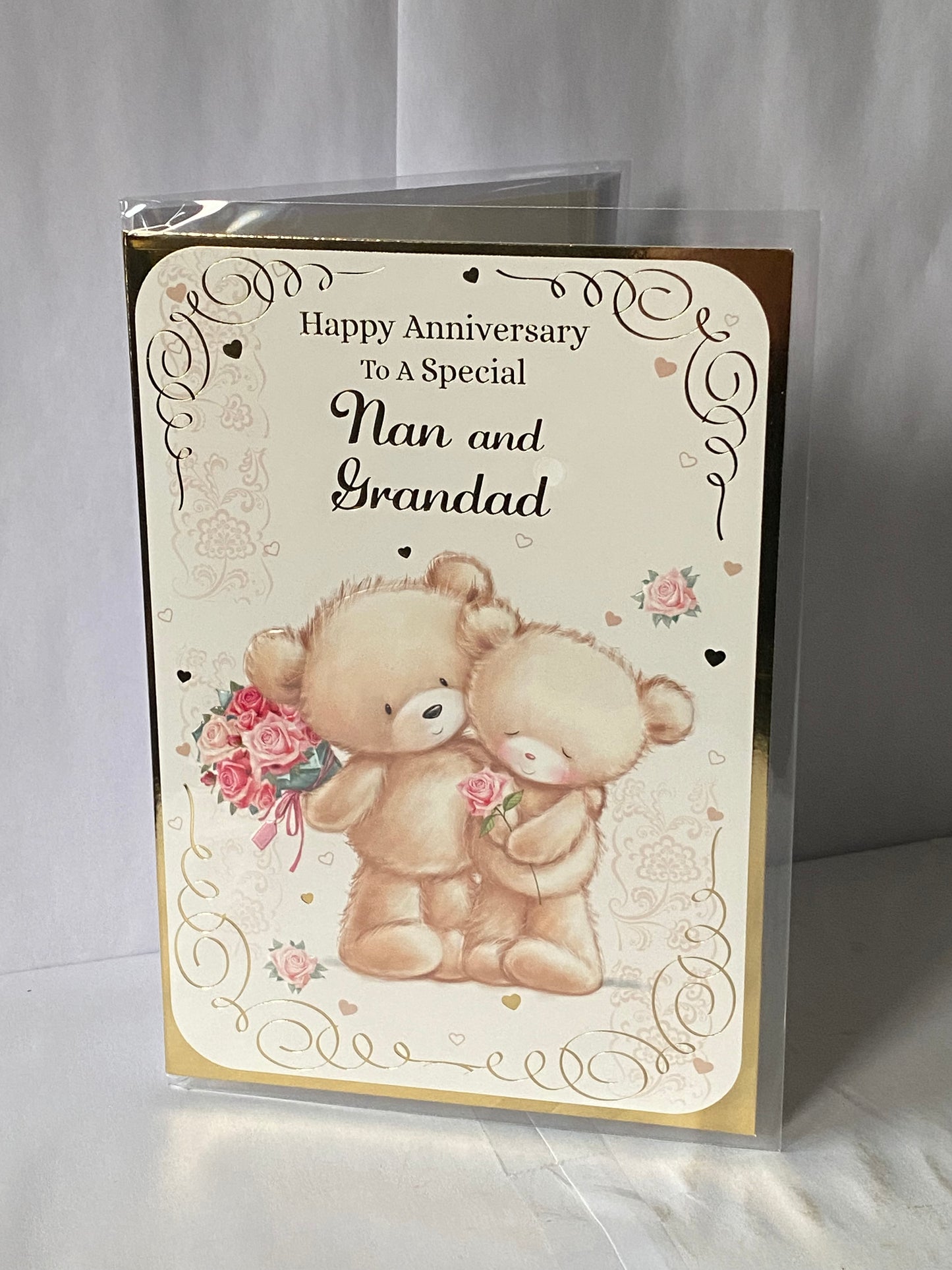 Happy Anniversary To A Special Nan And & Grandad On Your Wedding Anniversary Card Teddies Holding Flowers+Hugging Foil Detail(NC-VA051B)