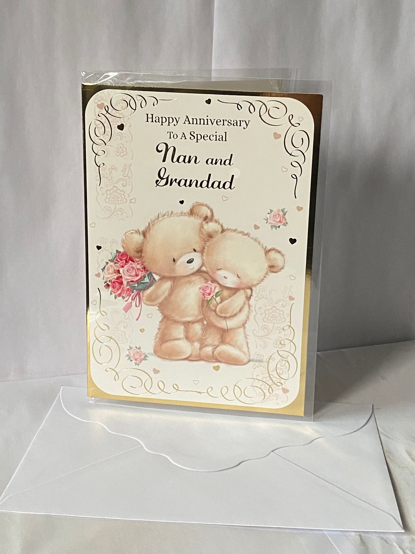 Happy Anniversary To A Special Nan And & Grandad On Your Wedding Anniversary Card Teddies Holding Flowers+Hugging Foil Detail(NC-VA051B)