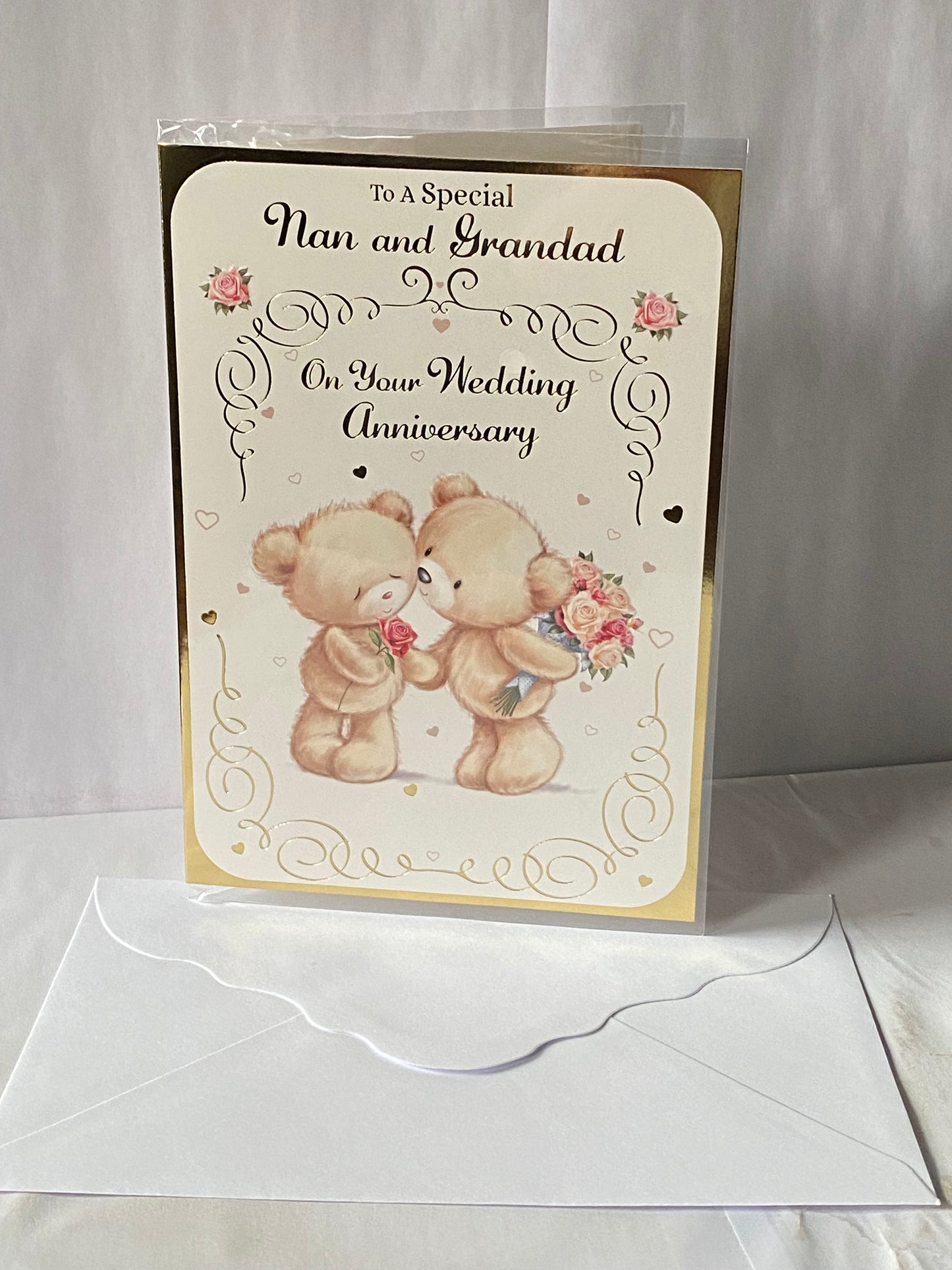 To A Special Nan And & Grandad On Your Wedding Anniversary Card Teddies Holding Flowers+Kissing Foil Detail(NC-VA051A)