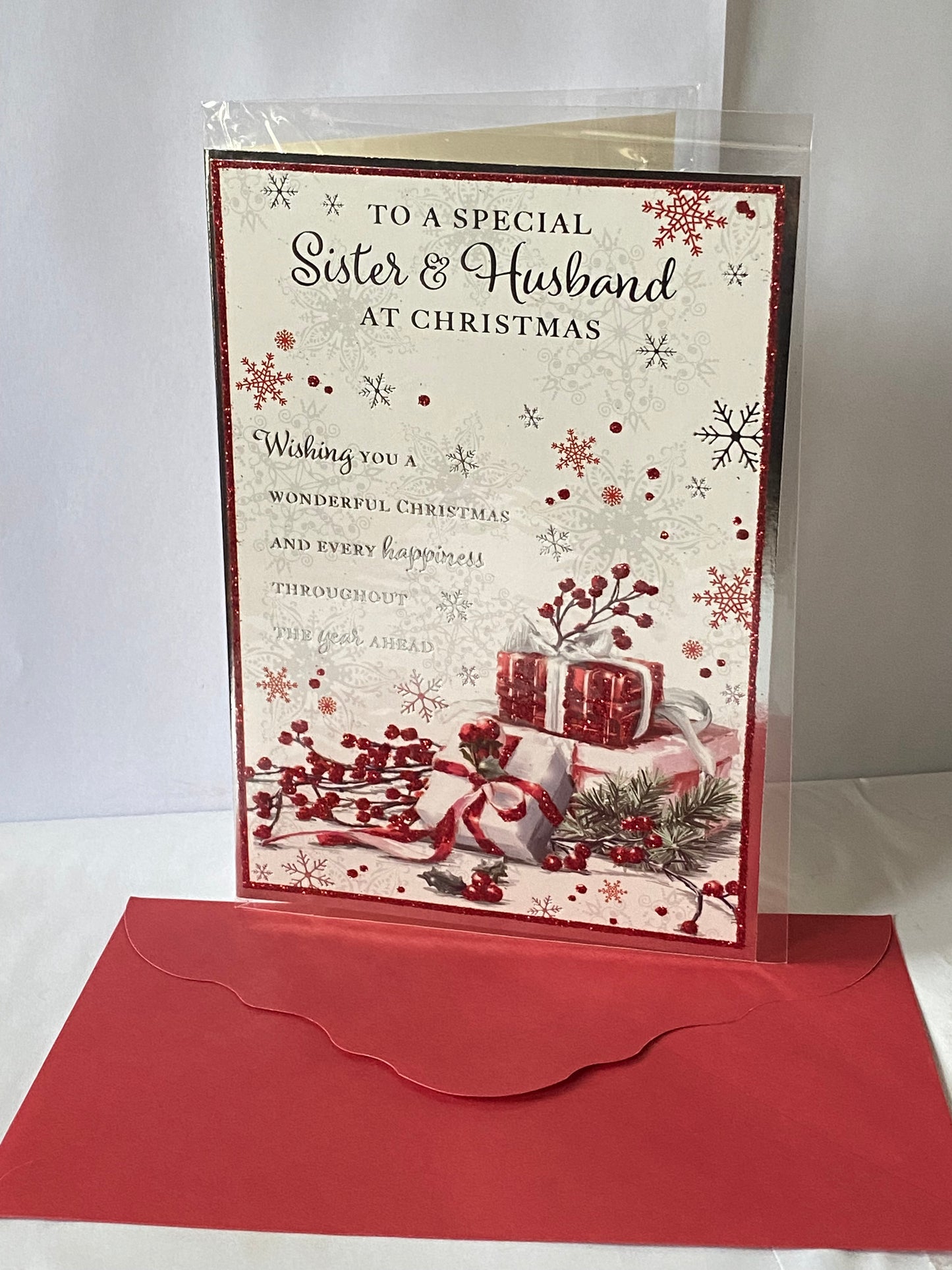 To A Special Sister & Husband At Christmas Card White/Red Presents/Silver Words(PH45208A)