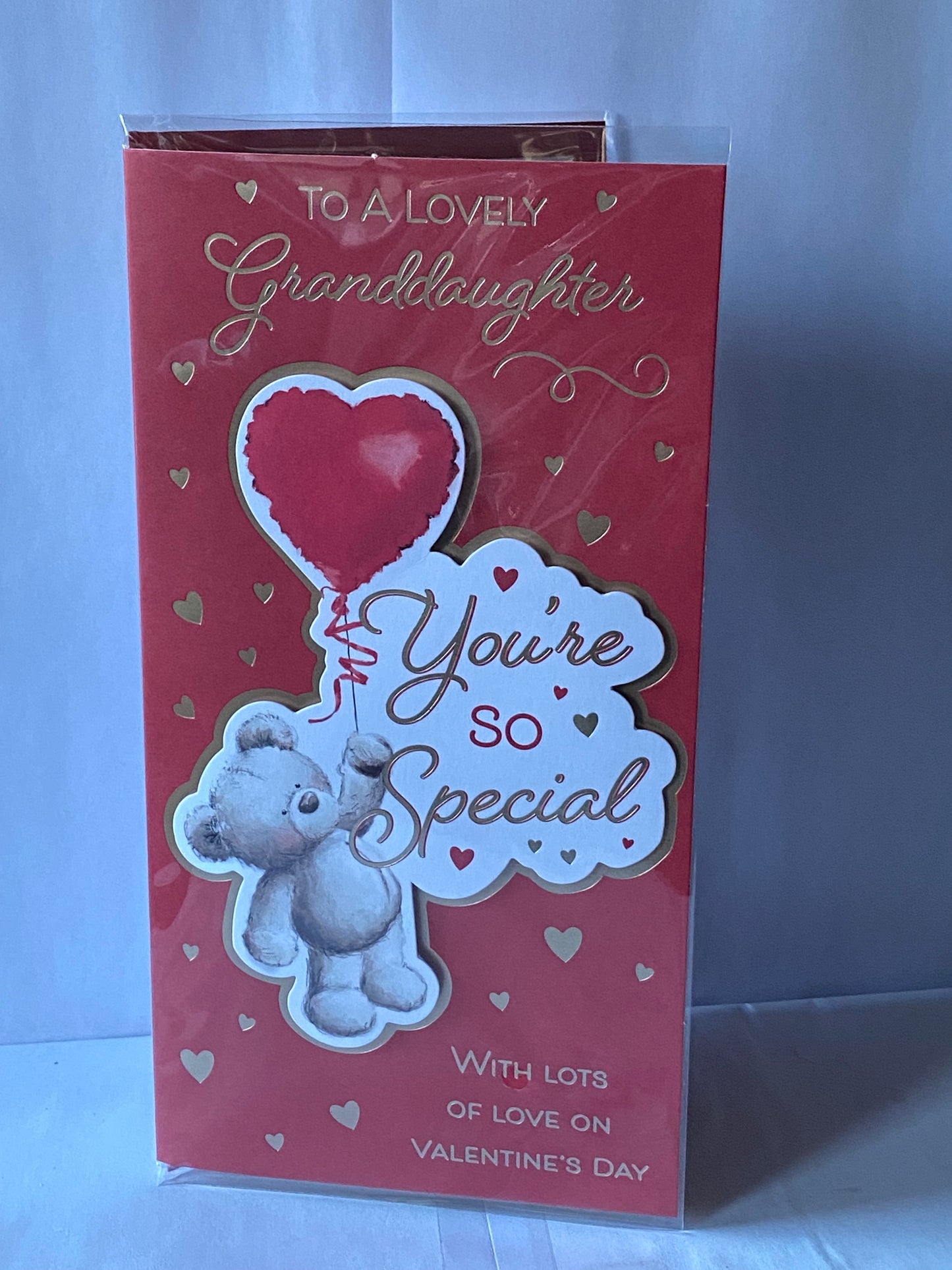 To A Lovely Granddaughter You're So Special Valentine's Day Valentines Day Card Red-Teddy Holding Red Heart Balloon/Gold Hearts 3D/Foil Detail(PRELUDE47552)