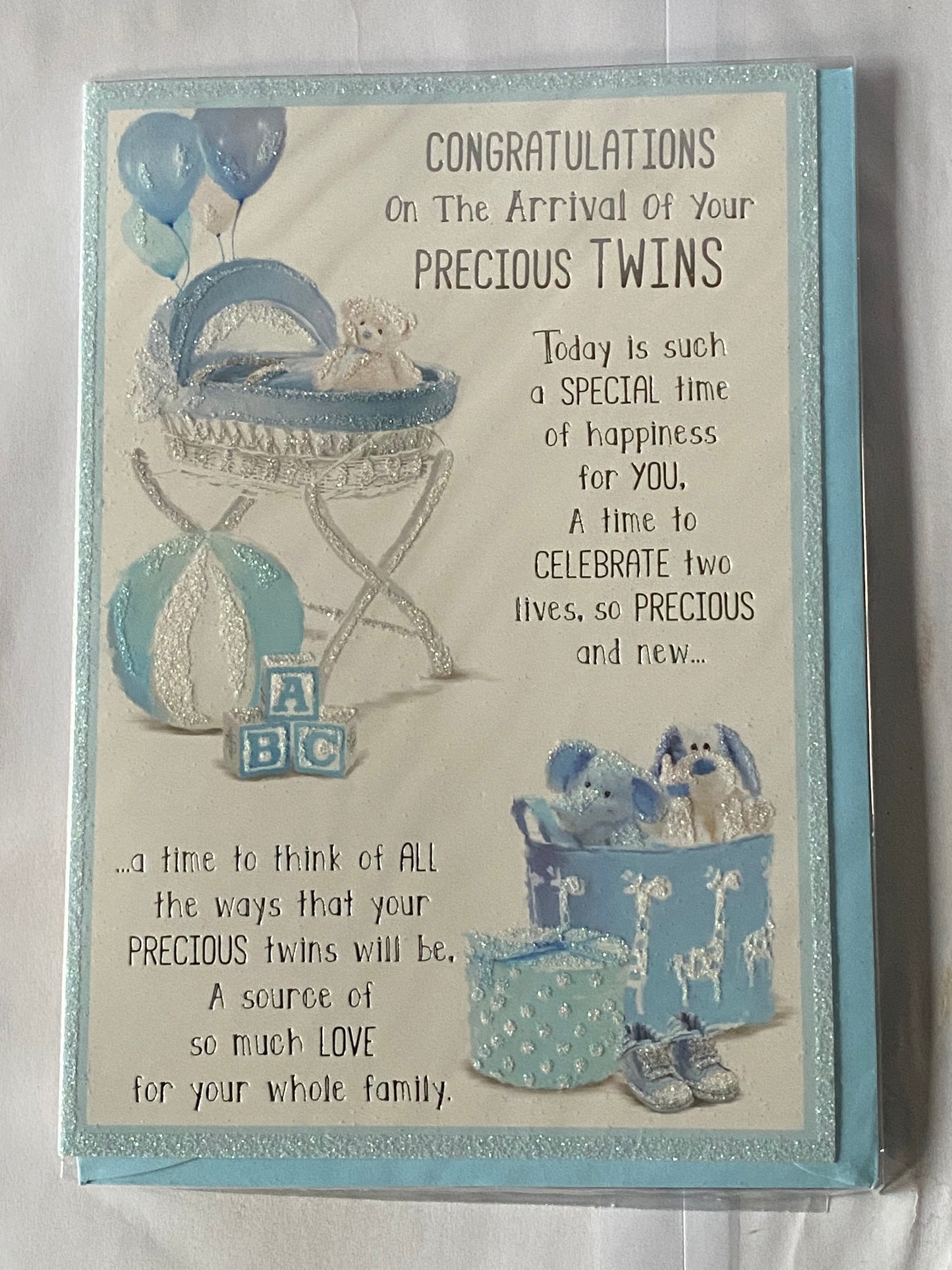 Congratulations On The Arrival Of Your Precious Twins New Baby Boy Twin Boys Born Birth Card White/Blue/Silver Moses Basket/Teddy/Toys/Words Glitter/Foil Detail(PH42353E)