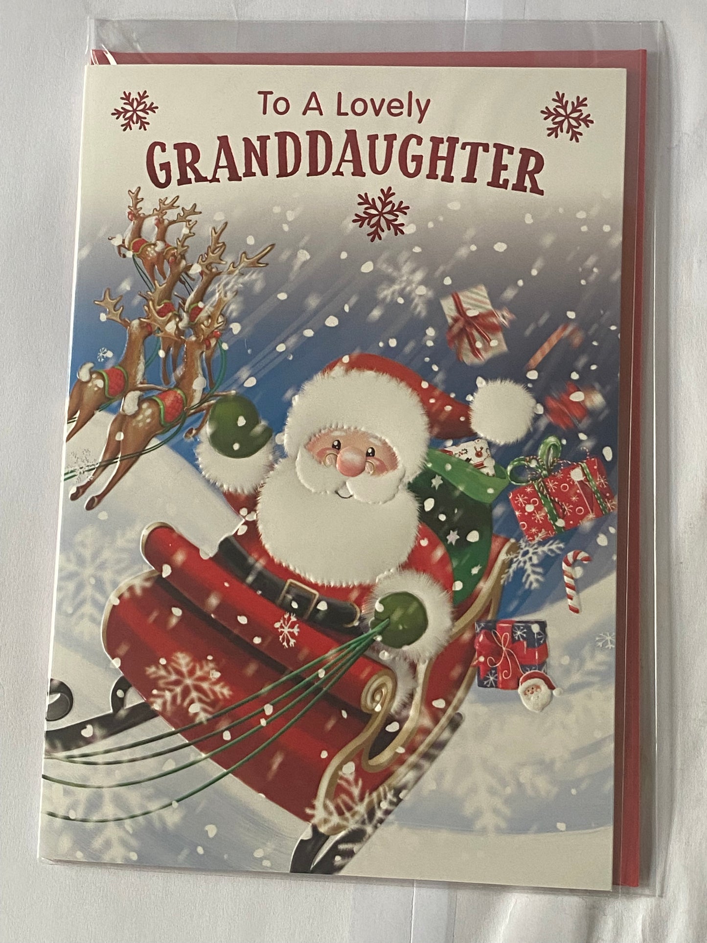 To A Lovely Granddaughter Christmas Card Cute Santa In Red Sleigh/Reindeer/Presents(VX183B)