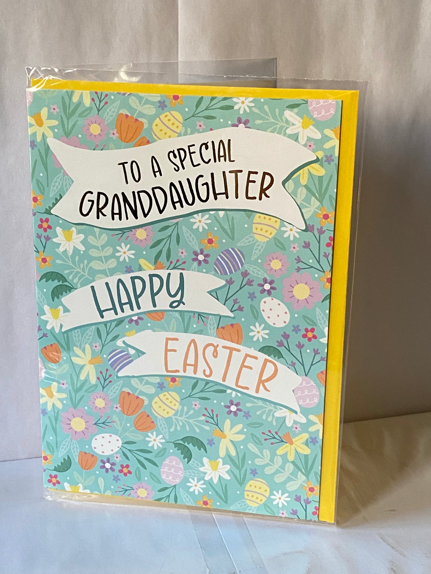To A Special Granddaughter Happy Easter Card Green-Multi Eggs/Multi Flowers/Words Foil Detail(PH50660B)
