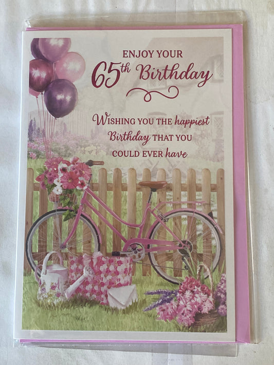 Ladies/Female Age 65 65th Sixty-Five Sixty-Fifth Enjoy Your 65th Birthday Card Pink Bicycle/Flowers/Balloons/Purple Words Foil Detail(PH48386A)