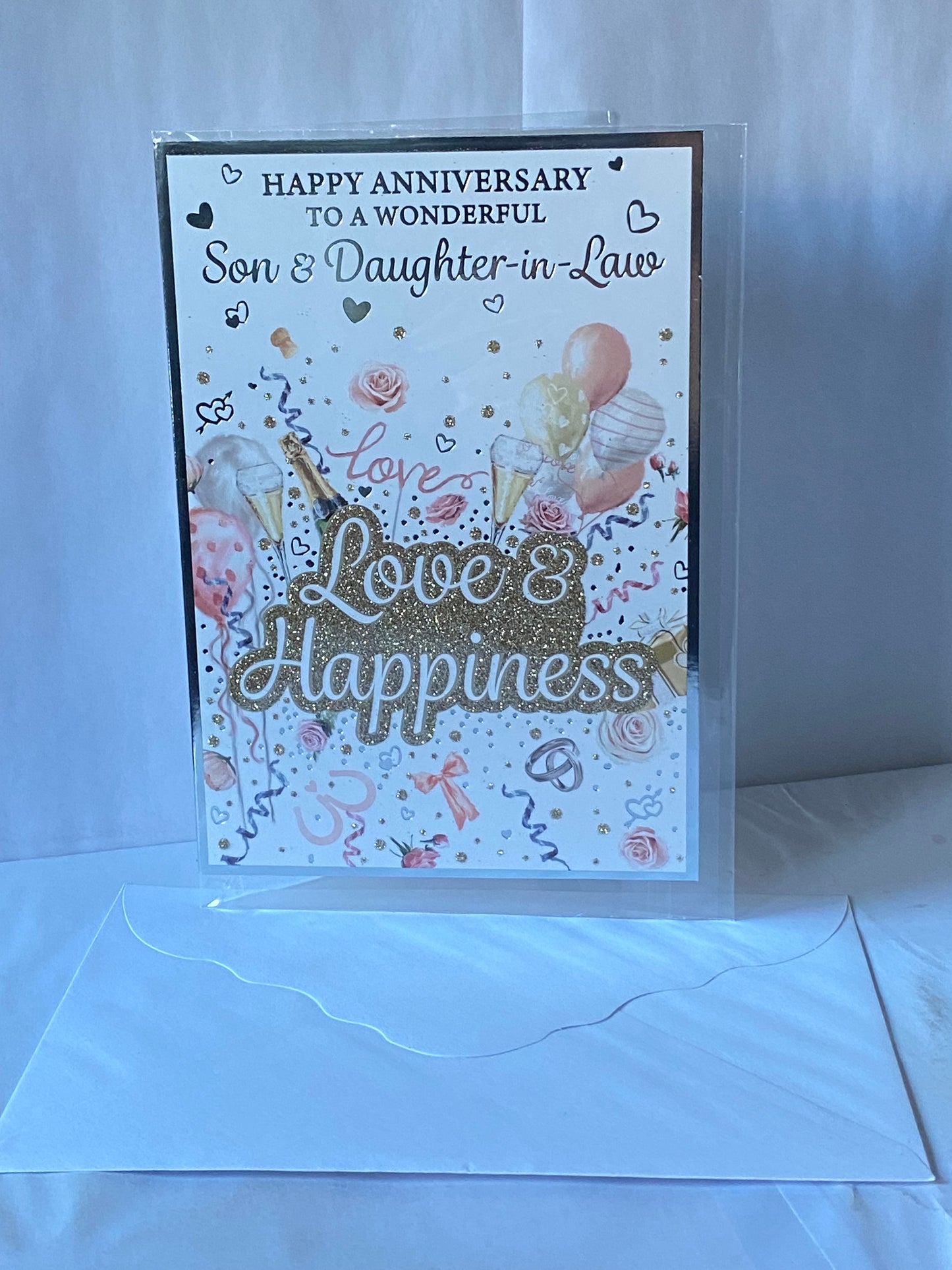 Happy Anniversary To A Wonderful Son & Daughter-In-Law Love & Happiness On Your Wedding Anniversary Card Balloons/Words Glitter/Foil Detail(PH48410B)