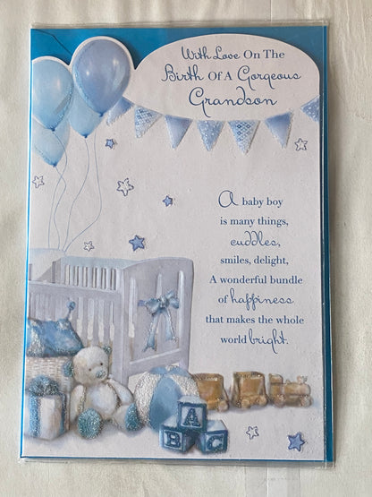 With Love On The Birth Of A Gorgeous Grandson New Baby Boy Born Card Birth Our Grandson From The Grandparents White/Blue-Cot/Teddy/Bunting/Blue Words Glitter Detail(KI38973)