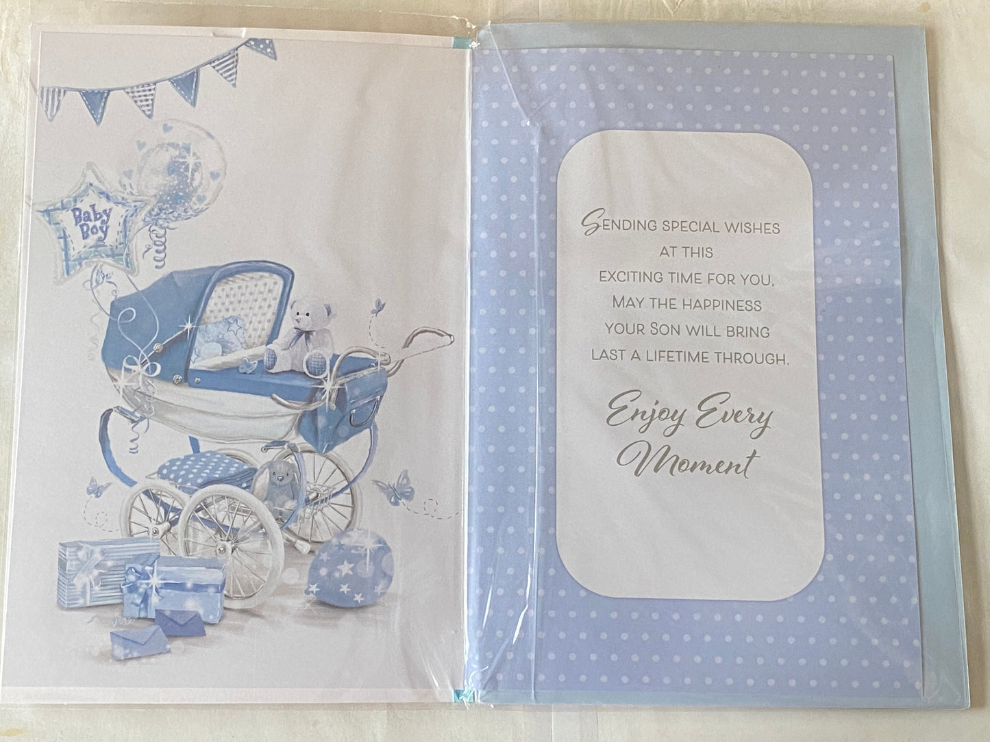 You're Leaving To Have A Baby Boy Card White/Blue Teddy/Pram/Balloons/Presents Ribbon/Foil Detail(PRELUDE45547)