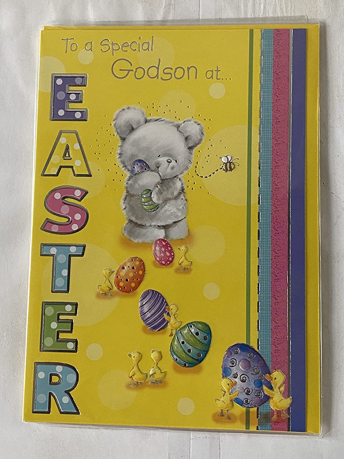 To A Special Godson At Easter Card Yellow-Teddy/Multi Easter Eggs/Multi Words/Stripes Foil Detail