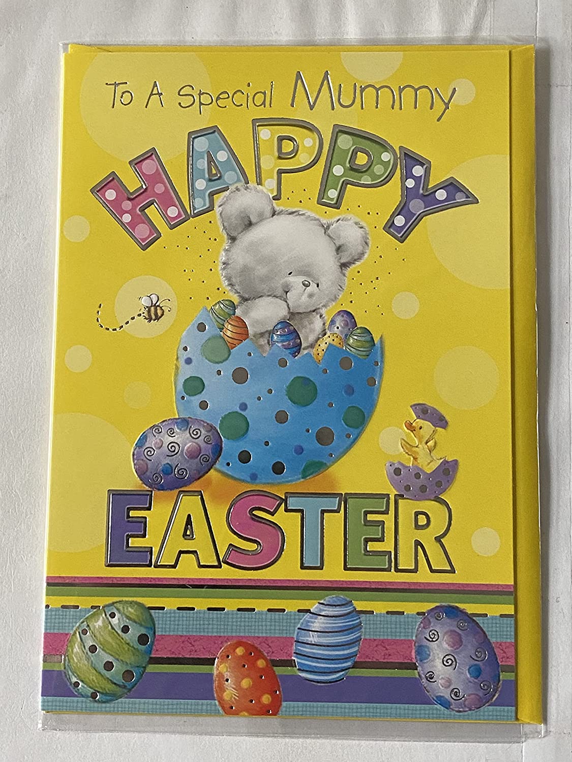 To A Special Mummy Happy Easter Card Yellow-Teddy In Big Blue Egg/Multi Easter Eggs/Multi Words/Stripes Foil Detail(PH33130E)